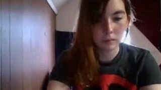 Sexy redheaded teen teases on webcam porn video